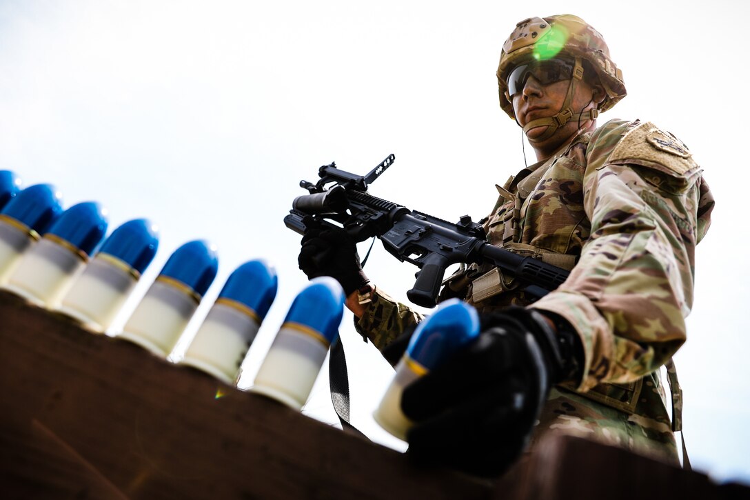 U.S. Army Reserve Spc. Jaime Delgado, a civil affairs specialist with 412th Civil Affairs Battalion, prepares to load an M320 grenade launcher during day one of the 2021 U.S. Army Civil Affairs and Psychological Operations Command (Airborne) Best Warrior Competition at Fort Jackson, S.C., April 8, 2021. The USACAPOC(A) BWC is an annual event that brings in competitors from across USACAPOC(A) to earn the title of “Best Warrior.” BWC tests the Soldiers’ individual ability to adapt and overcome challenging scenarios and battle-focused events, testing their technical and tactical skills under stress and extreme fatigue.