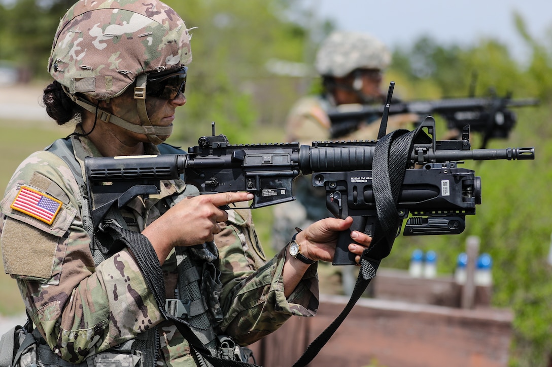 U.S. Army Reserve Spc. Arianna Hammel, a intelligence analyst with the 15th Psychological Operations Battalion fires an M320 grenade launcher during day one of the 2021 U.S. Army Civil Affairs and Psychological Operations Command (Airborne) Best Warrior Competition at Fort Jackson, S.C., April 8, 2021. The USACAPOC(A) BWC is an annual event that brings in competitors from across USACAPOC(A) to earn the title of “Best Warrior.” BWC tests the Soldiers’ individual ability to adapt and overcome challenging scenarios and battle-focused events, testing their technical and tactical skills under stress and extreme fatigue.