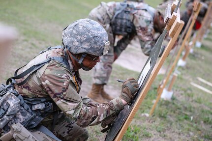 U.S. Army Reserve Spc. Daniel Bush, a civil affairs specialist with the 353rd Civil Affairs Command, participates in an M4 carbine qualification range during the second day of the 2021 U.S. Army Civil Affairs and Psychological Operations Command (Airborne) Best Warrior Competition at Fort Jackson, S.C., April 8, 2021. The USACAPOC(A) BWC is an annual event that brings in competitors from across USACAPOC(A) to earn the title of “Best Warrior.” BWC tests the Soldiers’ individual ability to adapt and overcome challenging scenarios and battle-focused events, testing their technical and tactical skills under stress and extreme fatigue.