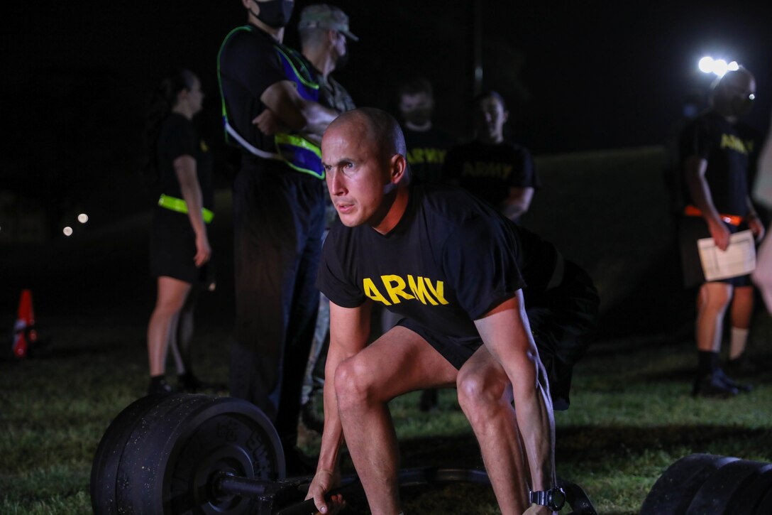 U.S. Army Reserve Staff Sgt. Jonathon Chacon, a Civil Affairs Specialist with the 426th  Civil Affairs Battalion, Upland, Calif., centers himself with proper form prior to executing the deadlift event of the Army Combat Fitness Test (ACFT) conducted at Ft. Jackson, S.C. Chacon is competing for the title “NCO of the Year” in the 2021 U.S. Army Civil Affairs and Psychological Operations Command (Airborne) Best Warrior Competition April 8 - 11, 2021. The USACAPOC(A) BWC is an annual competition that brings Soldiers from across the command to compete for the title of “Best Warrior.” BWC is designed to test each Soldiers’ mental and physical resilience as they adapt and overcome each scenario or task placed before them.