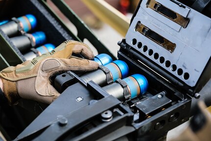 A U.S. Army Reserve Soldier loads a Mk 19 automatic grenade launcher, during the second day of the 2021 U.S. Army Civil Affairs and Psychological Operations Command (Airborne) Best Warrior Competition at Fort Jackson, S.C., April 8, 2021. The USACAPOC(A) BWC is an annual competition that brings in competitors from across USACAPOC(A) to earn the title of “Best Warrior.” BWC tests the Soldiers’ individual ability to adapt and overcome challenging scenarios and battle-focused events, testing their technical and tactical skills under stress and extreme fatigue.