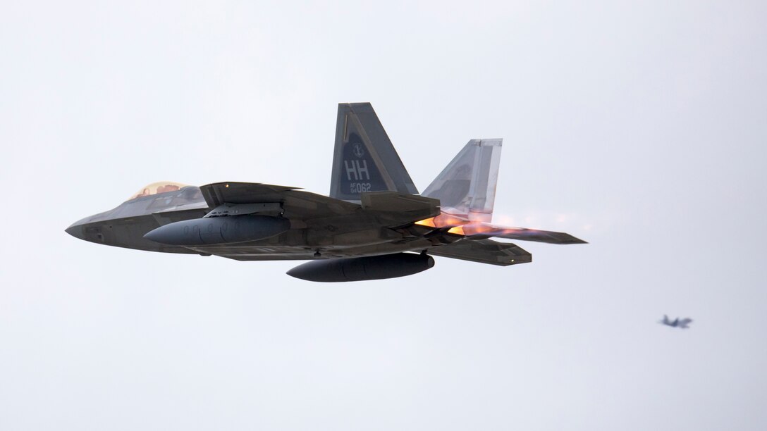 A U.S. Air Force F-22 Raptor aircraft with the 199th Fighter Squadron takes off from Marine Corps Air Station Iwakuni, Japan, April 5, 2021. The 199th Fighter Squadron deployed to MCAS Iwakuni to conduct integrated training with Marine and Naval forces as part of U.S. Indo-Pacific Command’s dynamic force employment concept.