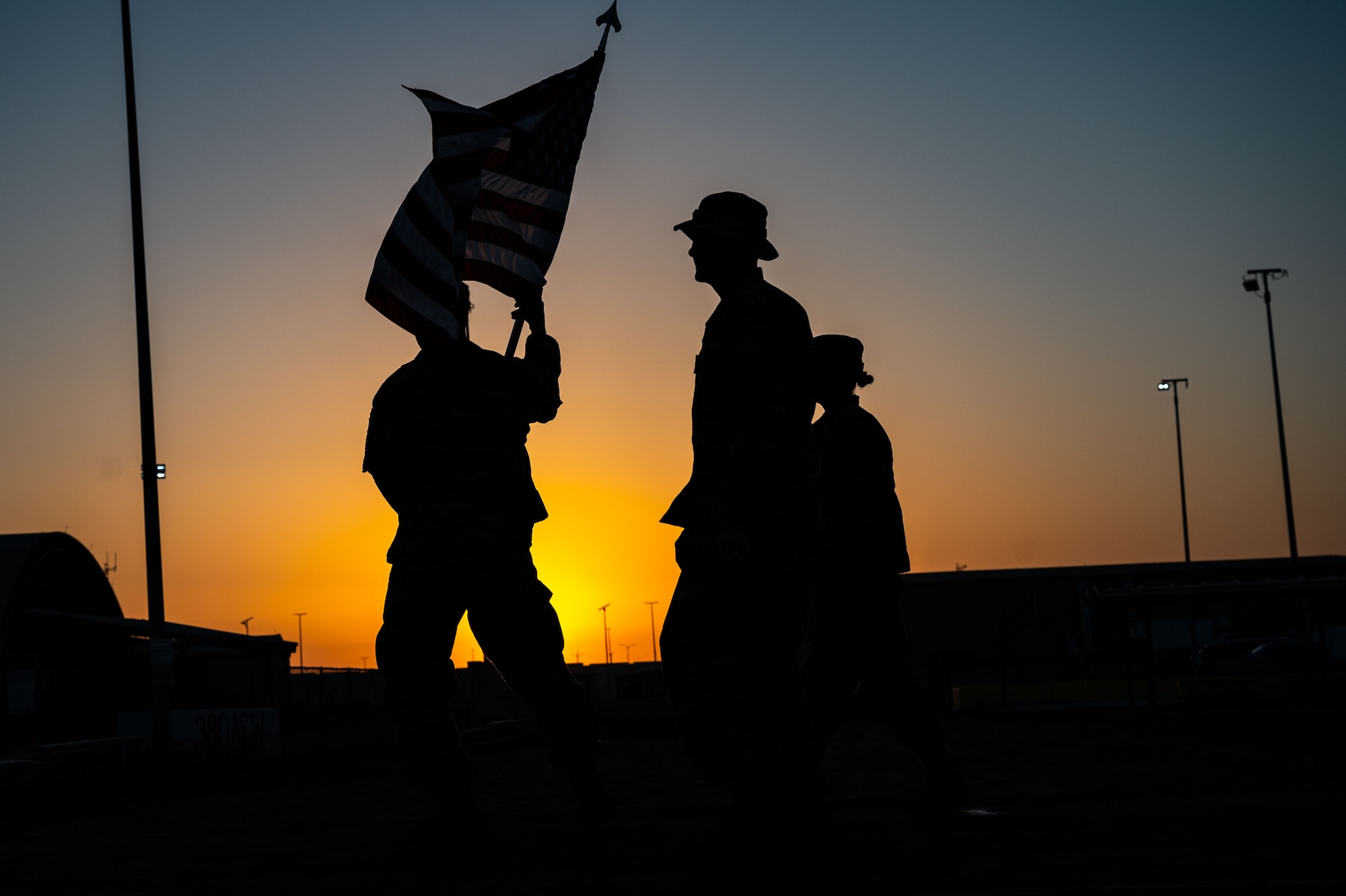 Members from the 380th Air Expeditionary Wing walk