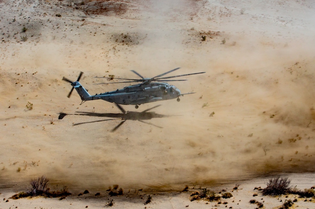 U.S. Marines with Marine Heavy Helicopter Squadron (HMH) 366 land a CH-53E Super Stallion helicopter at Marine Air-Ground Combat Center, California, March 31, 2021.