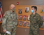 Brig. Gen. Adam Flasch, left, director of the joint staff for the Maryland National Guard, speaks with 2nd Lt. Adis Poško, Armed Forces of Bosnia-Herzegovina, at the Army Maneuver Center of Excellence at Fort Benning Army Base in Columbus, Ga., April 1, 2021. Flasch was visiting members of the Maryland National Guard and state partners from the Armed Forces of Bosnia-Herzegovina.