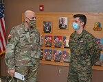 Brig. Gen. Adam Flasch, left, director of the joint staff for the Maryland National Guard, speaks with 2nd Lt. Adis Poško, Armed Forces of Bosnia-Herzegovina, at the Army Maneuver Center of Excellence at Fort Benning Army Base in Columbus, Ga., April 1, 2021. Flasch was visiting members of the Maryland National Guard and state partners from the Armed Forces of Bosnia-Herzegovina.