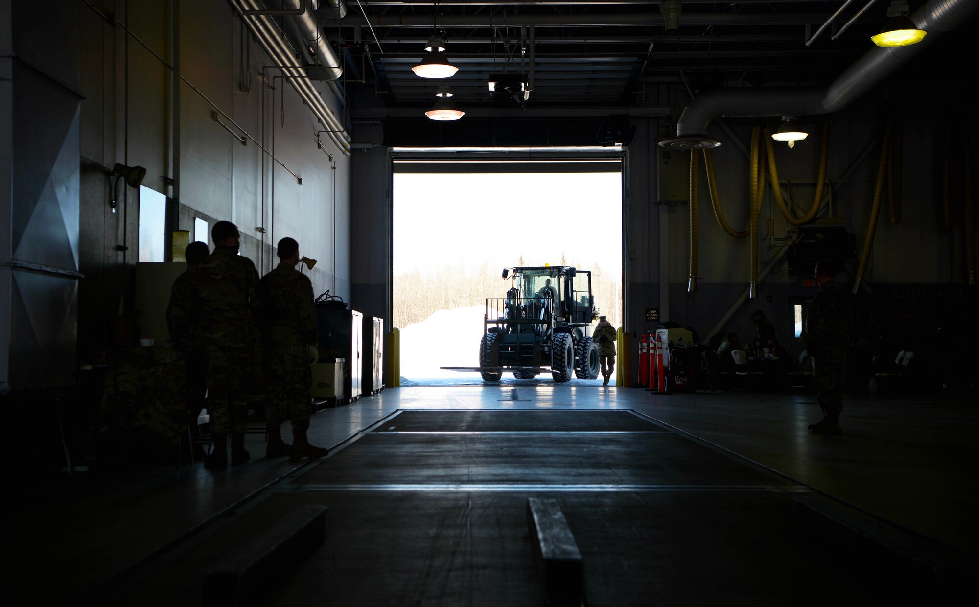 U.S. Air Force Airman 1st Class Cambrin Dixon, a 354th Logistics Readiness Squadron ground transportation vehicle operator, moves a cargo pallet using a forklift during Arctic Gold (AG) 21-1 April 6, 2021, on Eielson Air Force Base, Alaska. The purpose of Arctic Gold 21-2 is to evaluate the 354th Fighter Wing’s ability to effectively generate F-35A Lightning II aircraft and deploy personnel and cargo from across the wing. (U.S. Air Force photo by Senior Airman Beaux Hebert)