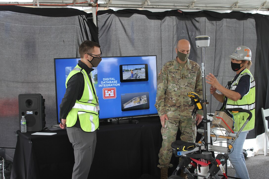 Patty Thompson, a Senior Health Physics Technician with Sevenson Environmental Services Inc., explains one of the high resolution site characterization tools developed for the Chambers Works FUSRAP project to Lt. Gen. Scott A. Spellmon, the 55th Chief of Engineers and Commanding General of the U.S. Army Corps of Engineers during an April 7, 2021 visit. Chris Bowles, a Senior Project Manager from Ramboll, is shown on the left.