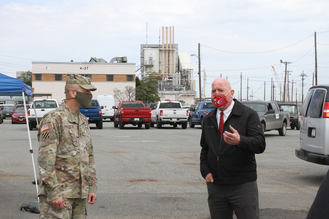 Lt. Gen. Scott A. Spellmon, the 55th Chief of Engineers and Commanding General of the U.S. Army Corps of Engineers, speaks with Curtis Heckelman, USACE Philadelphia District Deputy District Engineer for Programs and Project Management, during a visit to the former DuPont Chambers Works FUSRAP site in Deepwater, NJ on April 7, 2021.