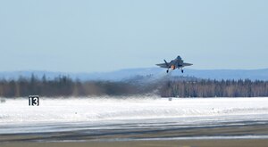 An F-35A Lightning II assigned to the 354th Fighter Wing takes off during Arctic Gold 21-2April 7, 2021, on Eielson Air Force Base, Alaska. As part of the exercise, the wing generated 25 F-35As and their cargo for deployment. (U.S. Air Force photo by Senior Airman Beaux Hebert)