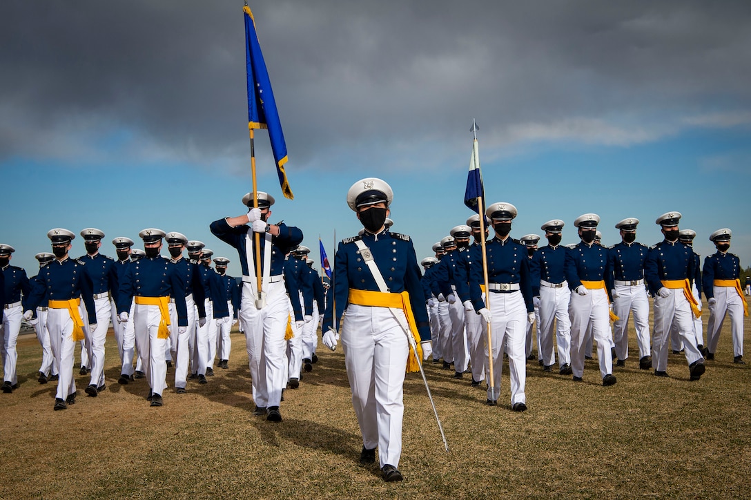 Air Force cadets march in formation.