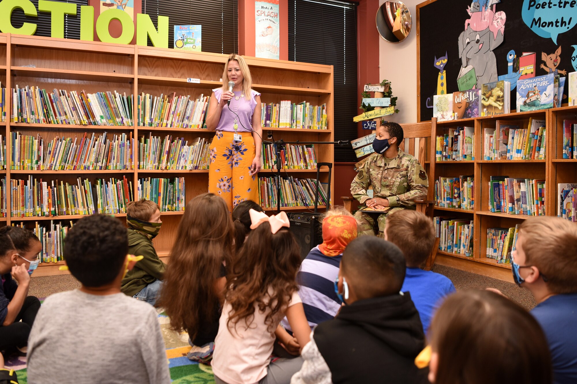 Glenmore Elementary Principal, Teri Gould, introduces U.S. Air Force Col. Lauren Byrd, 17th Medical Group commander, to a class of second-grade students in San Angelo, Texas, April 7, 2021. Byrd was invited by San Angelo Independent School District to read a book in celebration of San Angelo READS! and Month of the Military Child. (U.S. Air Force photo by Senior Airman Abbey Rieves)