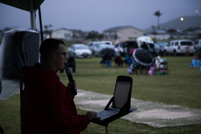 U.S. Navy Lt. Timothy Pate, deputy command chaplain, Marine Corps Base Hawaii, delivers a sermon during the annual Easter Sunrise church service, Landing Zone Eagle, MCBH, April 4, 2021. The service was open to service members and their families, and was held to celebrate Easter Sunday. (U.S. Marine Corps photo by Lance Cpl. Brandon Aultman)