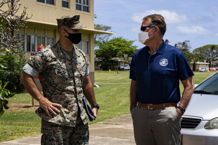 U.S. Marine Corps Col. Speros Koumparakis, commanding officer, Marine Corps Base Hawaii, greets U.S. Congressman Edward Case (D-HI) during his visit to MCBH, April 6, 2021. The purpose of the visit was to inform Case and staff on the installation’s roles, missions, and capabilities, as well as highlight the ways in which it supports operational forces, their families, and the surrounding community. (U.S. Marine Corps photo by Lance Cpl. Samantha Sanchez)