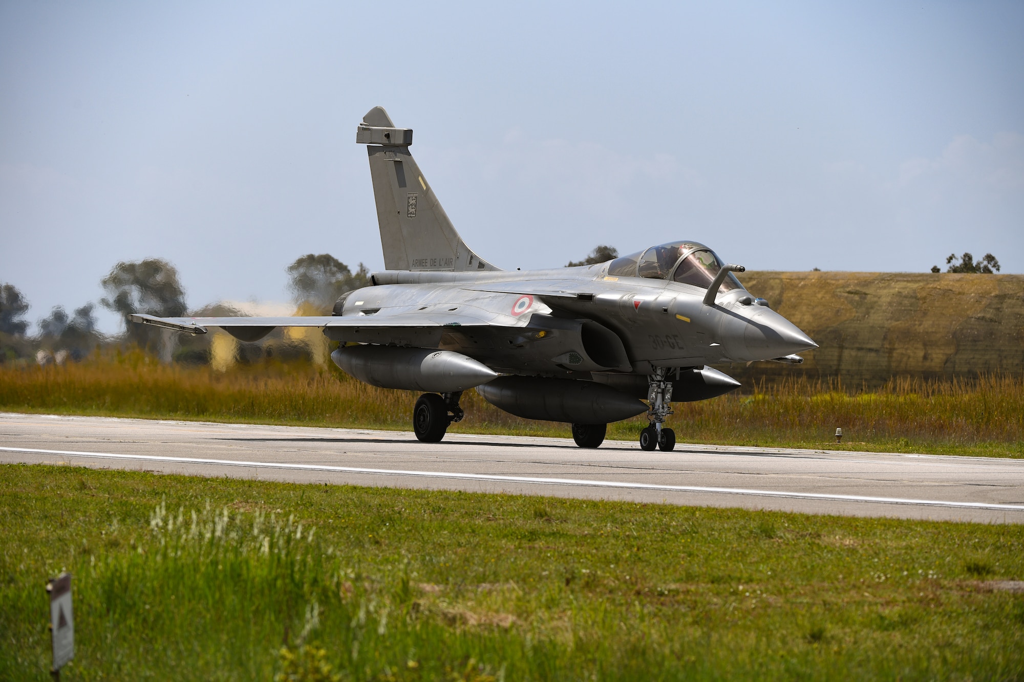 A French air force Rafale aircraft taxis on the runway at Andravida Air Base, Greece, April 7, 2021. The French air force arrived in Greece to participate in INIOCHOS 21. In addition to enhancing combat readiness and strengthening bonds, INIOCHOS provides participants the opportunity for developing capabilities in planning and conducting complex air operations in a multinational joint forces environment, leading to an advanced level of training for all participants. (U.S. Air Force photo by Airman 1st Class Thomas S. Keisler IV)