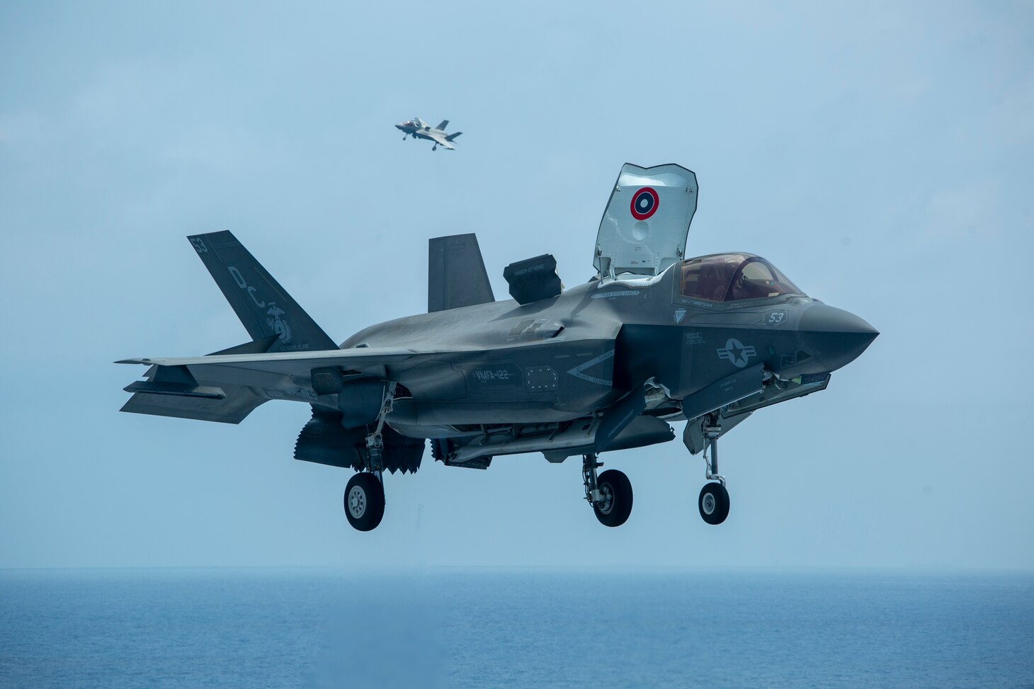 U.S. Marine Corps F-35B Lightning IIs assigned to Marine Medium Tiltrotor Squadron 164 (Reinforced), 15th Marine Expeditionary Unit, land on the flight deck of the amphibious assault ship USS Makin Island (LHD 8). The Makin Island Amphibious Ready Group and embarked 15th MEU are operating in the U.S. 7th Fleet area of operations to enhance interoperability with allies and partners and serve as a ready response force to defend peace and stability in the Indo-Pacific region.