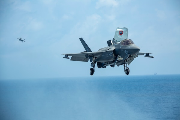 U.S. Marine Corps F-35B Lightning IIs assigned to Marine Medium Tiltrotor Squadron 164 (Reinforced), 15th Marine Expeditionary Unit, land on the flight deck of the amphibious assault ship USS Makin Island (LHD 8). The Makin Island Amphibious Ready Group and embarked 15th MEU are operating in the U.S. 7th Fleet area of operations to enhance interoperability with allies and partners and serve as a ready response force to defend peace and stability in the Indo-Pacific region.