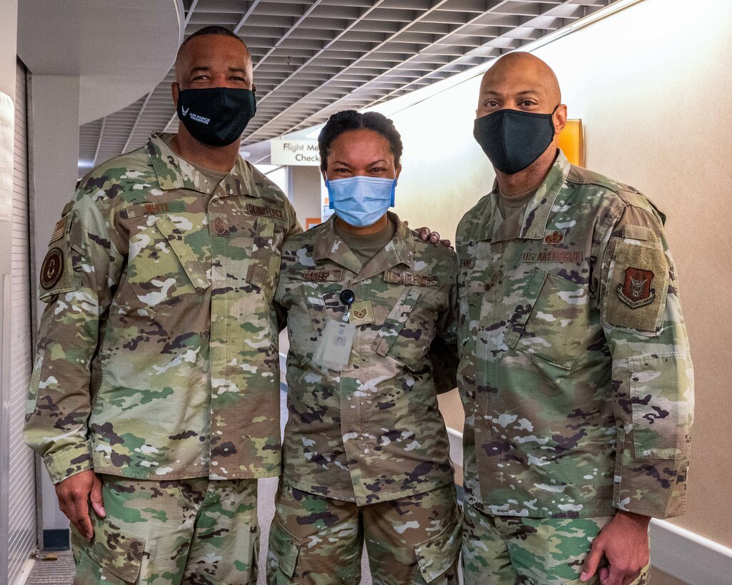 Staff. Sgt. Kaylan James, 913th Aerospace Medicine Squadron Flight Operational Medical Technician, discusses her experience as a Reserve Citizen Airman and federal employee with Chief Master Sgt. Timothy C. White Jr., the Senior Enlisted Advisor to the Chief of Air Force Reserve, April 10, 2021, Little Rock Air Force Base, Ark. White visited several squadrons to see first-hand the capabilities of the 913th Reserve Citizen Airmen. (U.S. Air Force Reserve photo by Maj. Ashley Walker)(image was altered to blur badge)