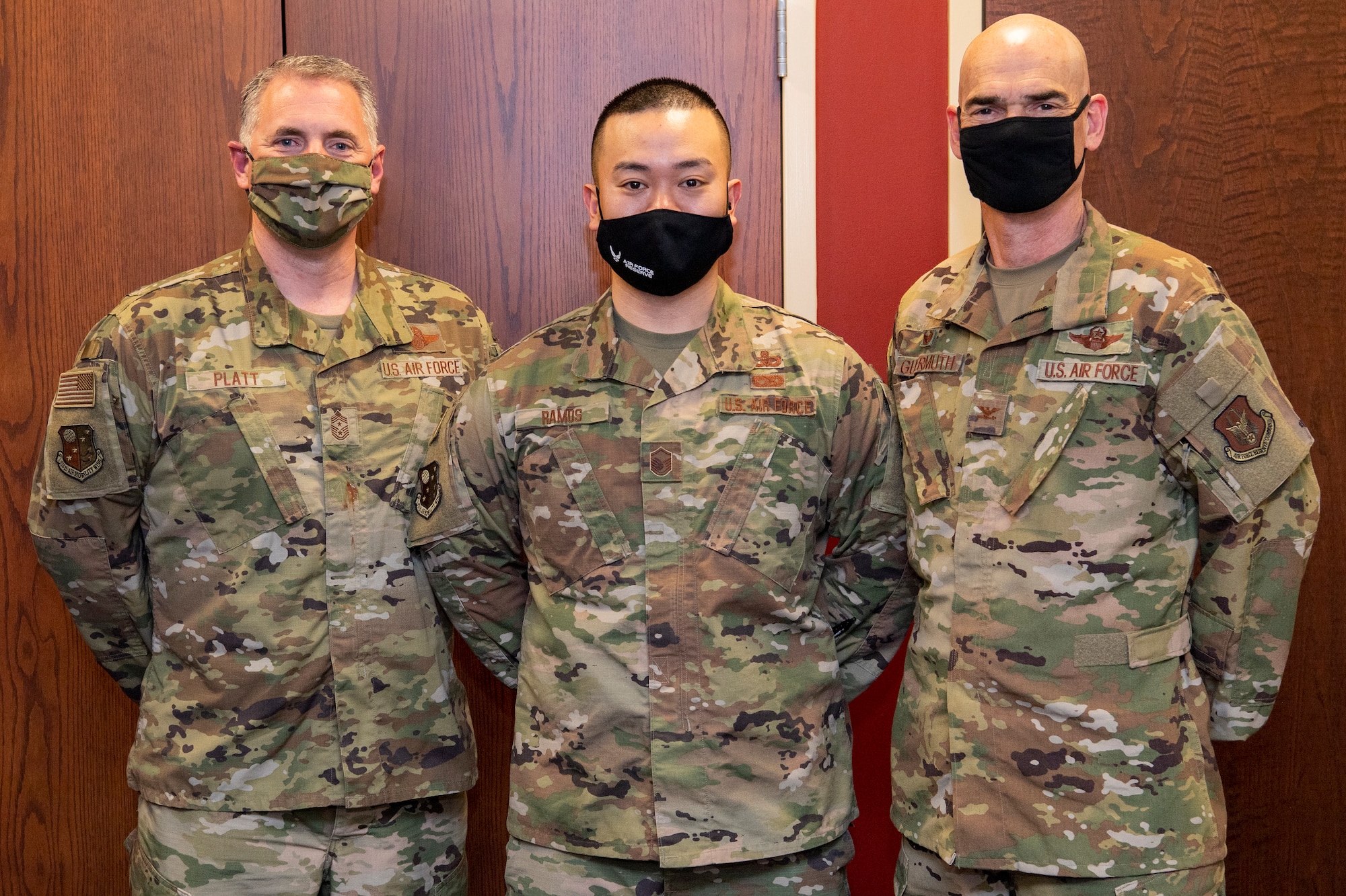 Reserve Citizen Airmen Master Sgt. Donald A. Ramos, superintendent of religious affairs with the 514th Air Mobility Wing, poses for a photo with Col. William H. Gutermuth, 514th AMW commander, and Chief Tige E. Platt, 514th AMW command chief, at Joint Base McGuire-Dix-Lakehurst, N.J., April. 10, 2021. Ramos received the 2020 Air Force Chaplain Corps Citizen Airman Award, given to the most deserving outstanding reserve religious affairs airman