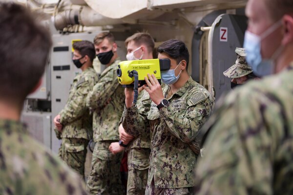 Midshipmen visit the Arleigh Burke-class guided missile destroyer USS Bainbridge (DDG 96), April 11. 180 midshipmen from the United States Naval Academy (USNA) visited Naval Station Norfolk, April 10-11. This is the first of several fleet orientation weekends in April which will introduce more than 500 midshipmen to the surface and amphibious warfare force. (U.S. Navy photo by Mass Communication Specialist 2nd Class Jacob Milham/Released)