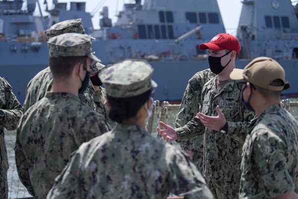 Midshipmen visit the San Antonio-class amphibious transport dock ship USS Arlington (LPD 24), April 11. 180 midshipmen from the United States Naval Academy (USNA) visited Naval Station Norfolk, April 10-11. This is the first of several fleet orientation weekends in April which will introduce more than 500 midshipmen to the surface and amphibious warfare force. (U.S. Navy photo by Mass Communication Specialist 2nd Class Jacob Milham/Released)