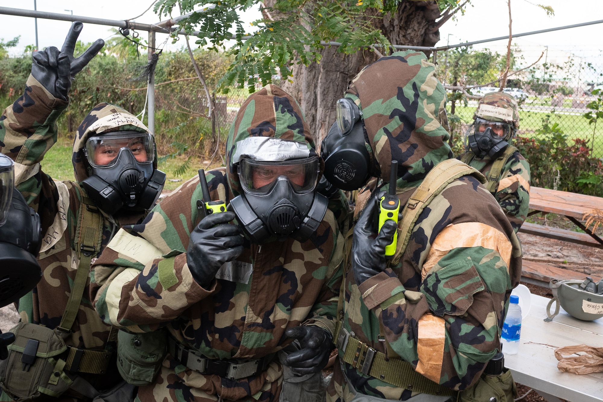 Airmen from the 154th Force Support Squadron, donned in personal protective equipment, conduct Chemical, Biological, Radiological, Nuclear and Explosive training February 23, 2021, at Joint Base Pearl-Harbor-Hickam, Hawaii.