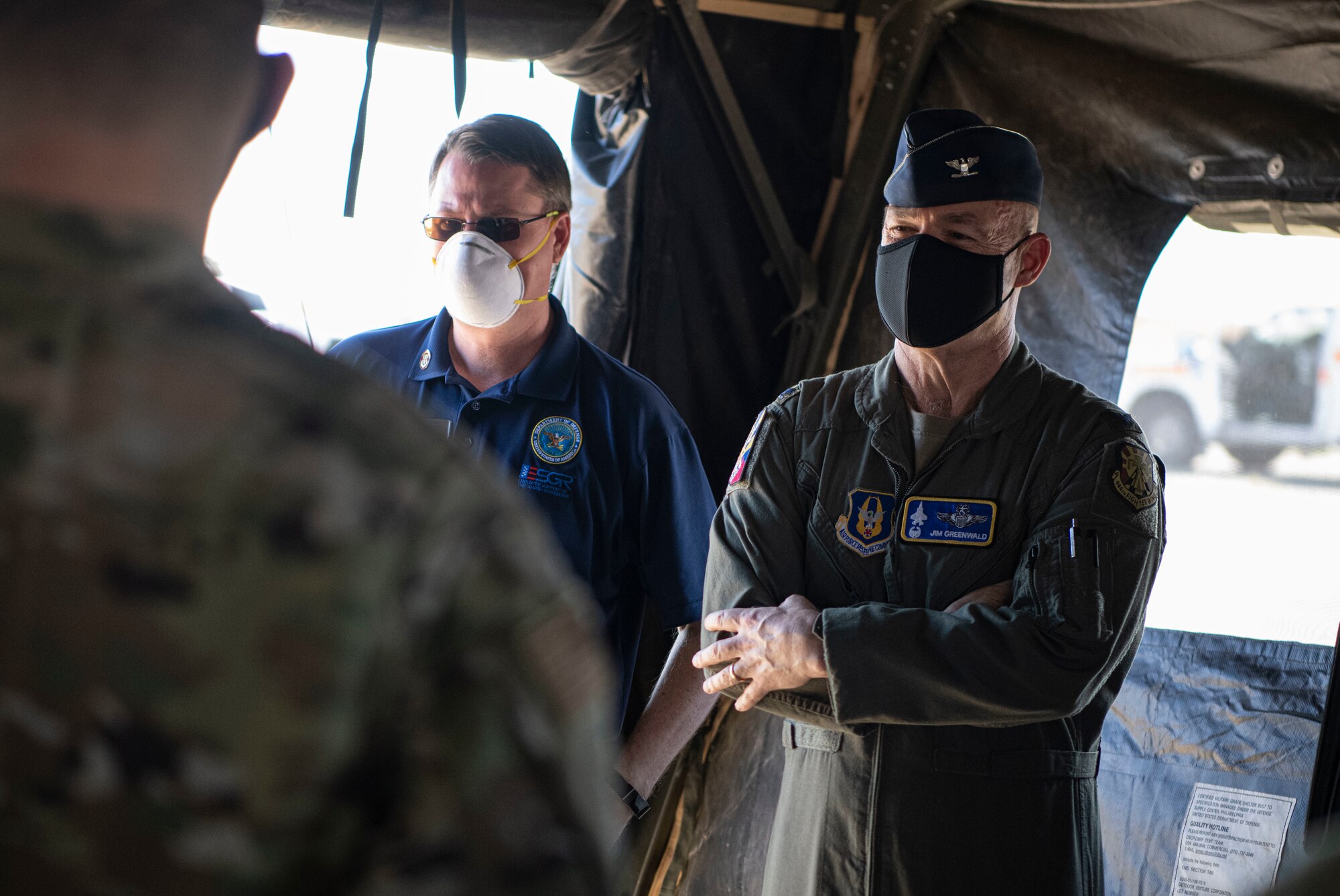 Col. James Greenwald, Commander of the 944th Fighter Wing, listens to a field services briefing while hosting a tour for new Honorary Commanders at Luke Air Force Base, Arizona, April 10, 2021. The 944th FW inducted the 2021-2023 class of Honorary Commanders as part of the wing’s ongoing community outreach program.