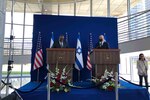 Secretary of Defense Lloyd J. Austin, left, and Israeli Defense Minister Benny Gantz speak to the news media following a meeting at the Israeli Defense Ministry, April 11, 2021.