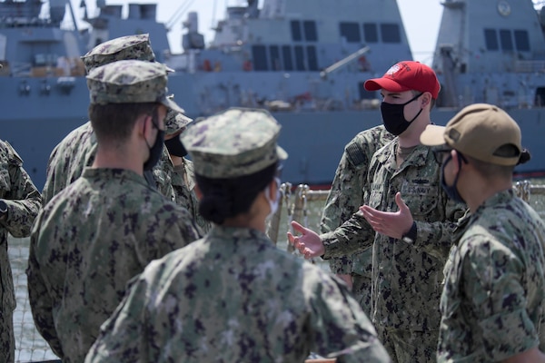 Midshipmen visit the San Antonio-class amphibious transport dock ship USS Arlington (LPD 24), April 11. 180 midshipmen from the United States Naval Academy (USNA) visited Naval Station Norfolk, April 10-11. This is the first of several fleet orientation weekends in April which will introduce more than 500 midshipmen to the surface and amphibious warfare force. (U.S. Navy photo by Mass Communication Specialist 2nd Class Jacob Milham/Released)