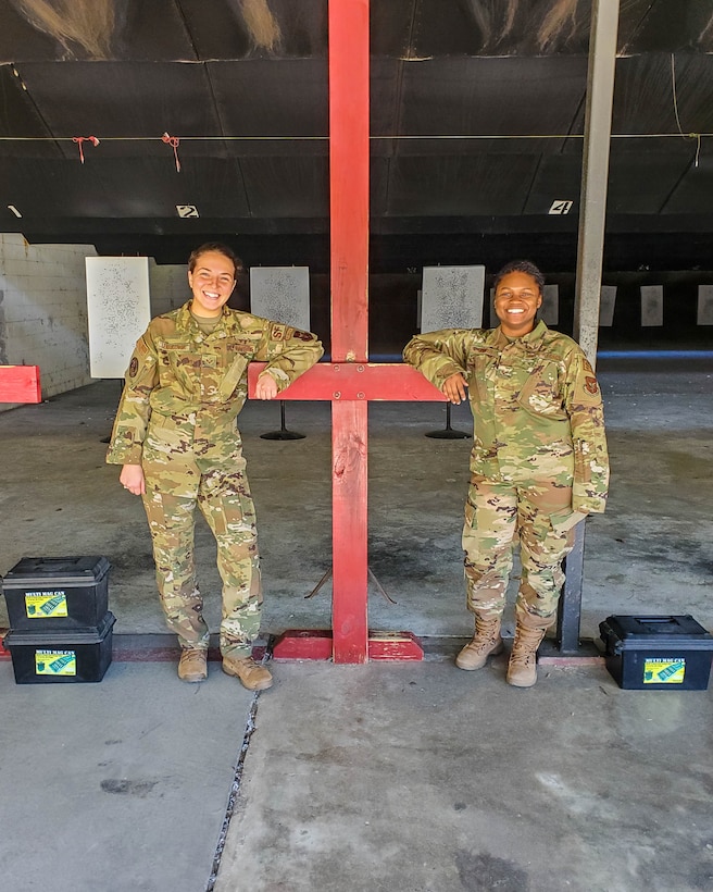 Senior Airman Sydney Lewandowski and Senior Airman Destiny Cooper train at the firing range at Joint Base Charleston, S.C. March 7, 2021. Training is an integral part of mission readiness and combat efficancy. Lewandowski is a Phoenix Raven and Cooper is a combat arms instructor and both are assigned to the 315th Security Forces Squadron.