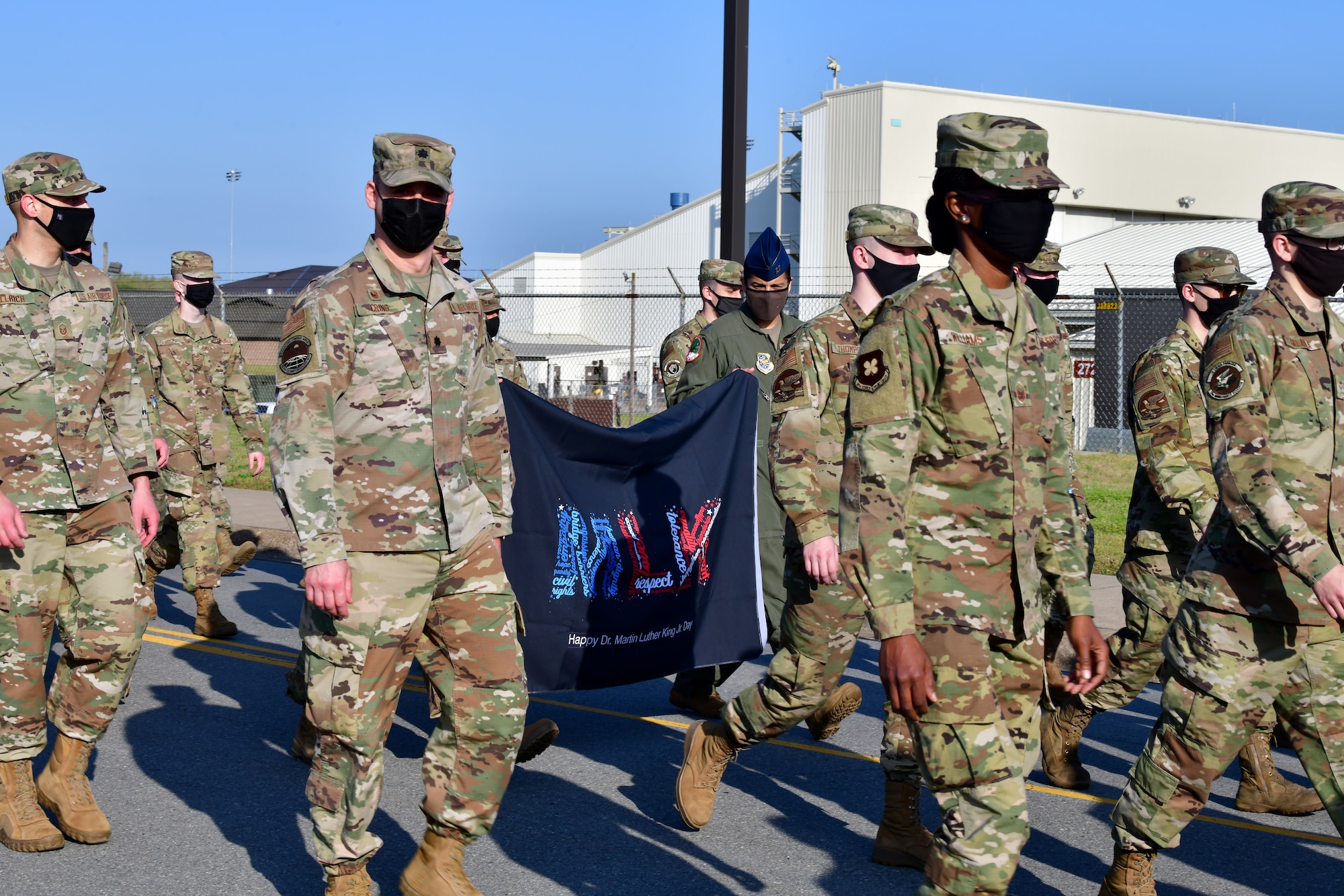 Airmen participate in a march