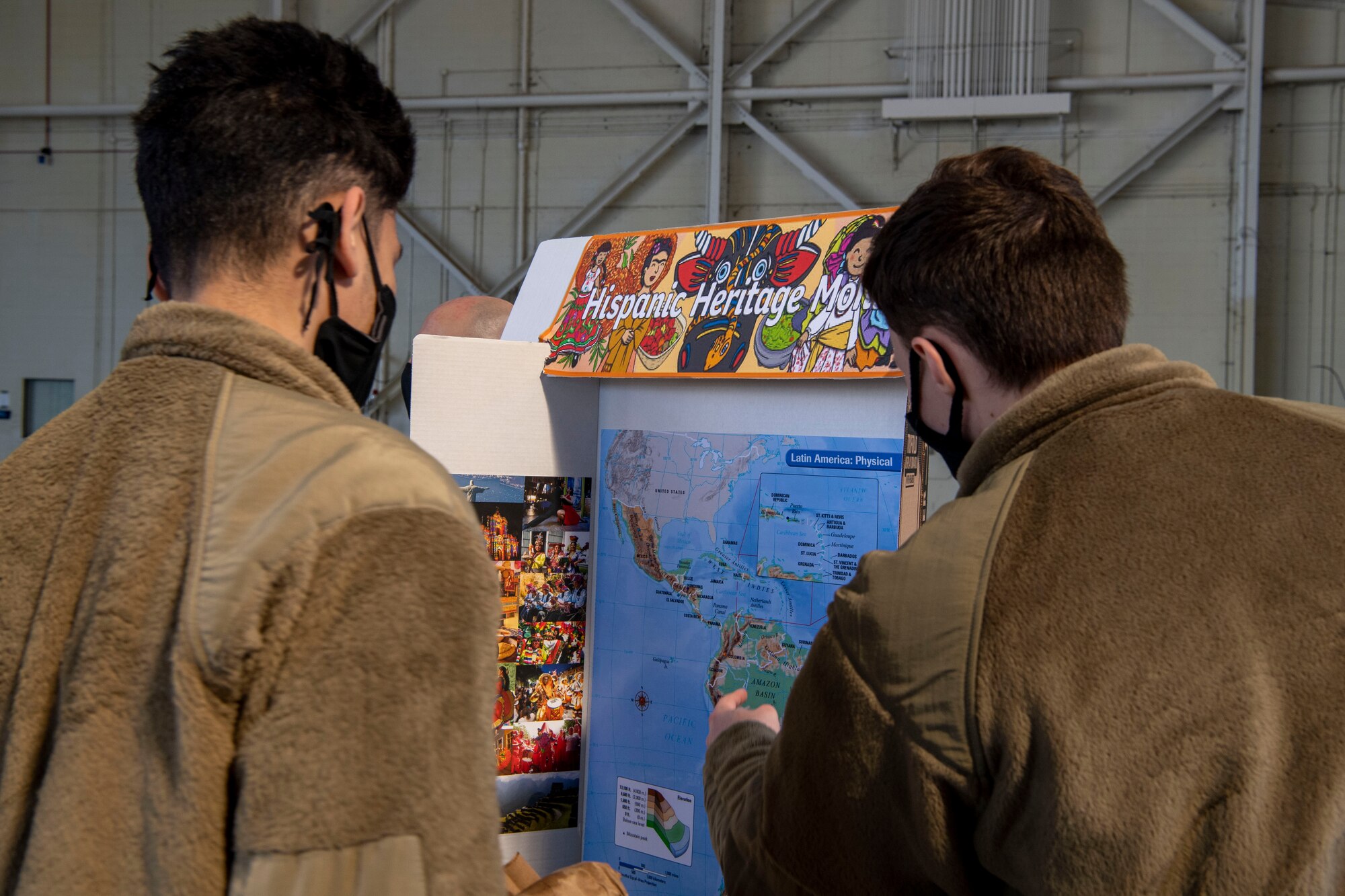 Airmen view a booth