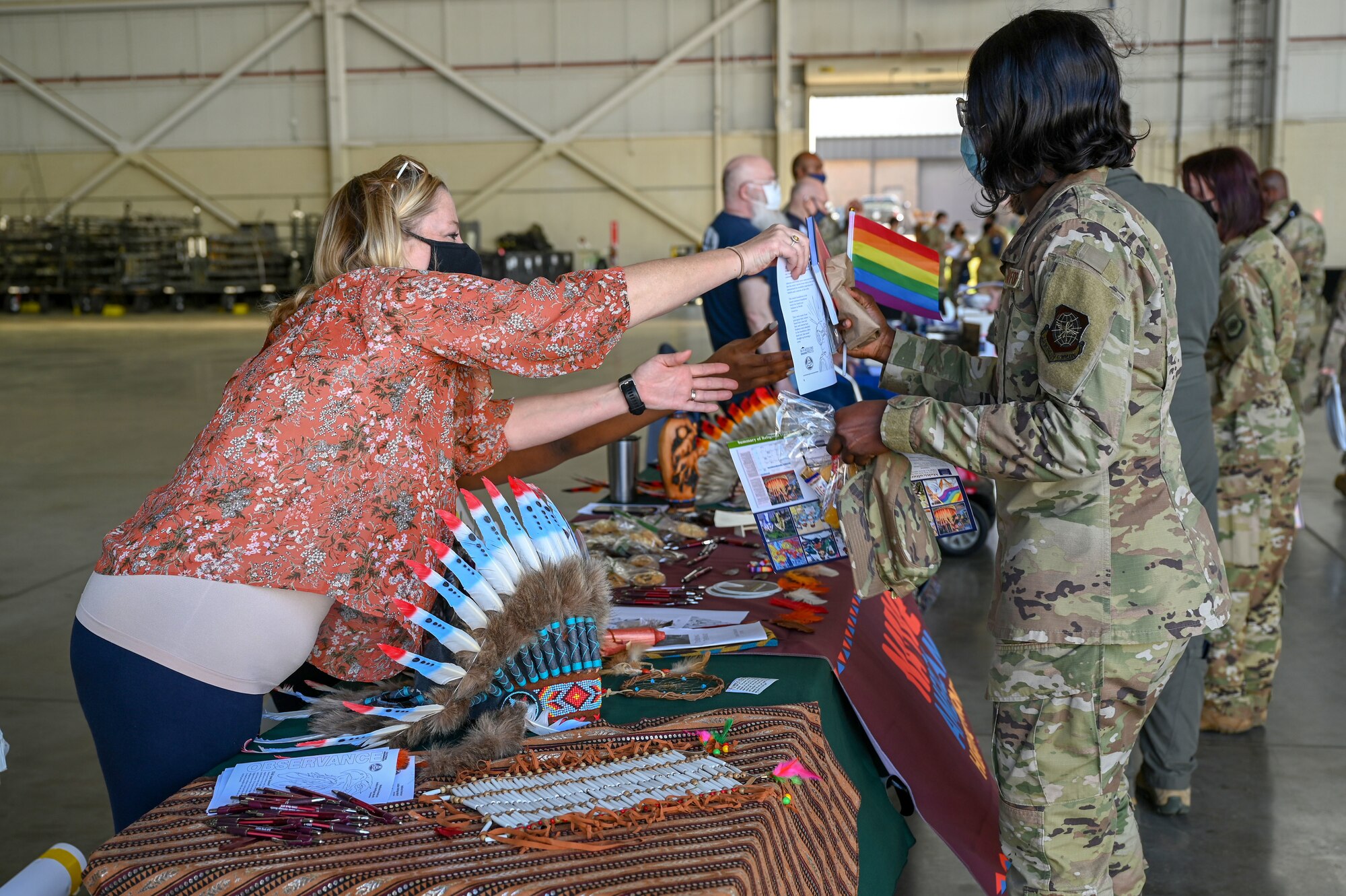 Airmen view a booth