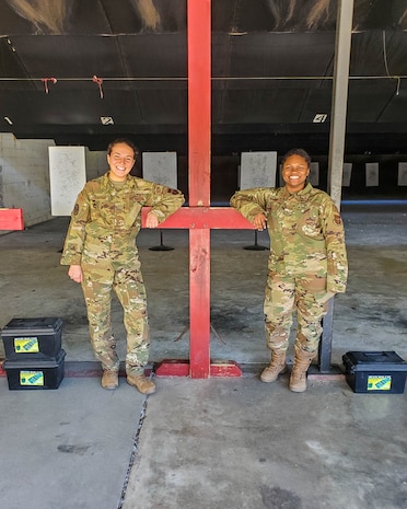 Senior Airman Sydney Lewandowski and Senior Airman Destiny Cooper train at the firing range at Joint Base Charleston, S.C. March 7, 2021. Training is an integral part of mission readiness and combat efficancy. Lewandowski is a Phoenix Raven and Cooper is a combat arms instructor and both are assigned to the 315th Security Forces Squadron.