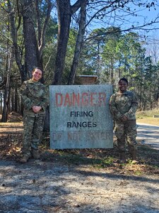 Senior Airman Sydney Lewandowski and Senior Airman Destiny Cooper train at the firing range at Joint Base Charleston, S.C. March 7, 2021. Training is an integral part of mission readiness and combat efficancy. Lewandowski is a Phoenix Raven and Cooper is a combat arms instructor and both are assigned to the 315th Security Forces Squadron.