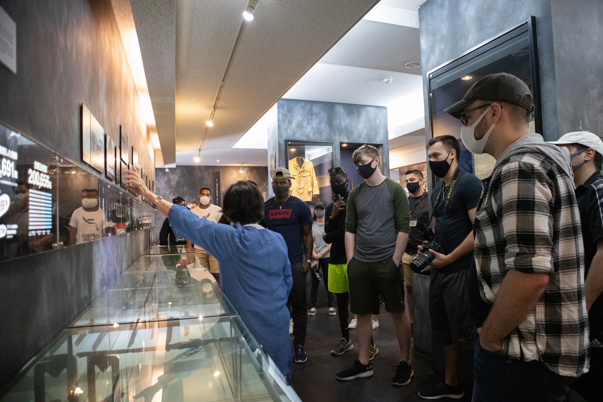 U.S. Airmen from the 18th Maintenance Group tour the Japanese Naval Underground.