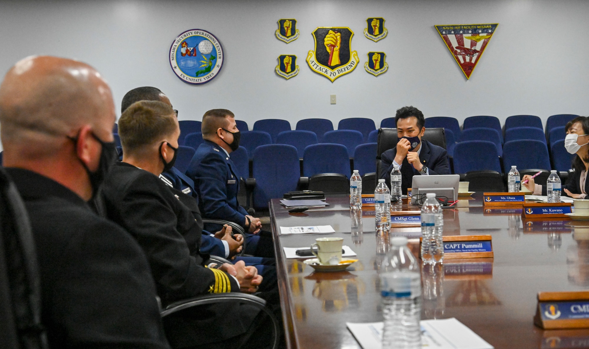 Takashi Uto, center, Japan State Minister of Foreign Affairs, receives a mission briefing with U.S. military leaders during his visit to Misawa Air Base, Japan, April 12, 2021. During the briefing, Uto and base leaders discussed the base's mission and relationship within the local community, Japan, and Indo-Pacific Command. (U.S. Air Force photo by Tech. Sgt. Timothy Moore)