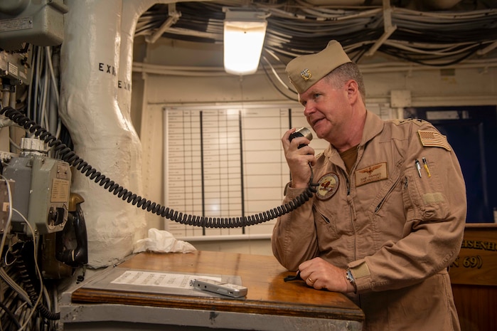 210411-N-AY174-1086 DUQM (April 11, 2021) - Vice Adm. Samuel Paparo, commander of U.S. Naval Forces Central Command (NAVCENT), U.S. 5th Fleet and Combined Maritime Forces speaks with Sailors aboard aircraft carrier USS Dwight D. Eisenhower (CVN 69) during a sustainment and logistics visit in Duqm, Oman, April 11. The Eisenhower Carrier Strike Group is deployed to the U.S. 5th Fleet area of operations in support of naval operations to ensure maritime stability and security in the Central Region, connecting the Mediterranean and Paciﬁc through the western Indian Ocean and three strategic choke points. (U.S. Navy photo by Mass Communication Specialist 3rd Class Brianna T. Thompson-Lee)