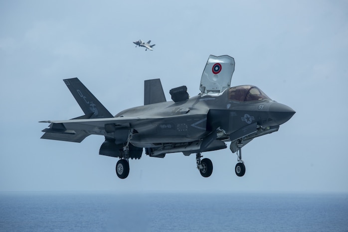 U.S. Marine Corps F-35B Lightning IIs assigned to Marine Medium Tiltrotor Squadron 164 (Reinforced), 15th Marine Expeditionary Unit, land on the flight deck of the amphibious assault ship USS Makin Island (LHD 8). The Makin Island Amphibious Ready Group and embarked 15th MEU are operating in the U.S. 7th Fleet area of operations to enhance interoperability with allies and partners and serve as a ready response force to defend peace and stability in the Indo-Pacific region.