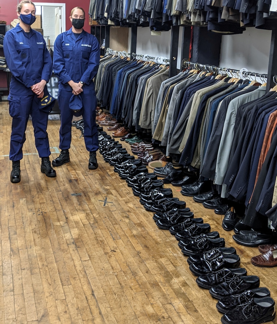 Two Honor Guard members donated dozens of gently used dress shoes to a local menswear clothing closet.