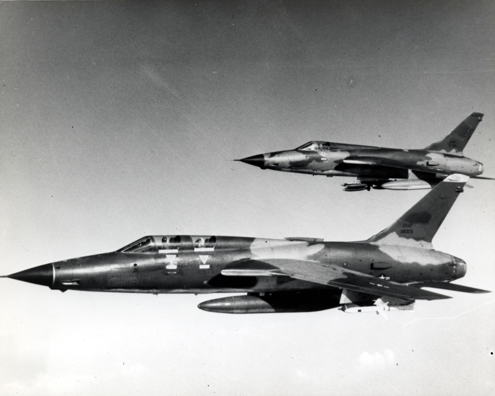 The elements of a hunter-killer team: F-105F Wild Weasel with Shrikes and F-105D with bombs. (U.S. Air Force photo)