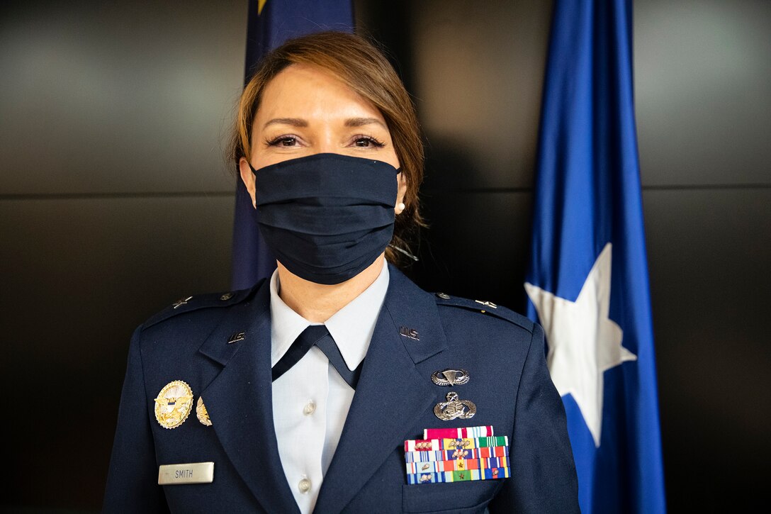 Brig. Gen. Tracy D. Smith, assistant adjutant general-air and commander of the Alaska Air National Guard, poses for a photo after she was promoted to the rank of brigadier general at a ceremony on Joint Base Elmendorf-Richardson, Alaska, April 1, 2021. Smith took command of the Alaska Air National Guard in January. (U.S. Army National Guard photo by Edward Eagerton)