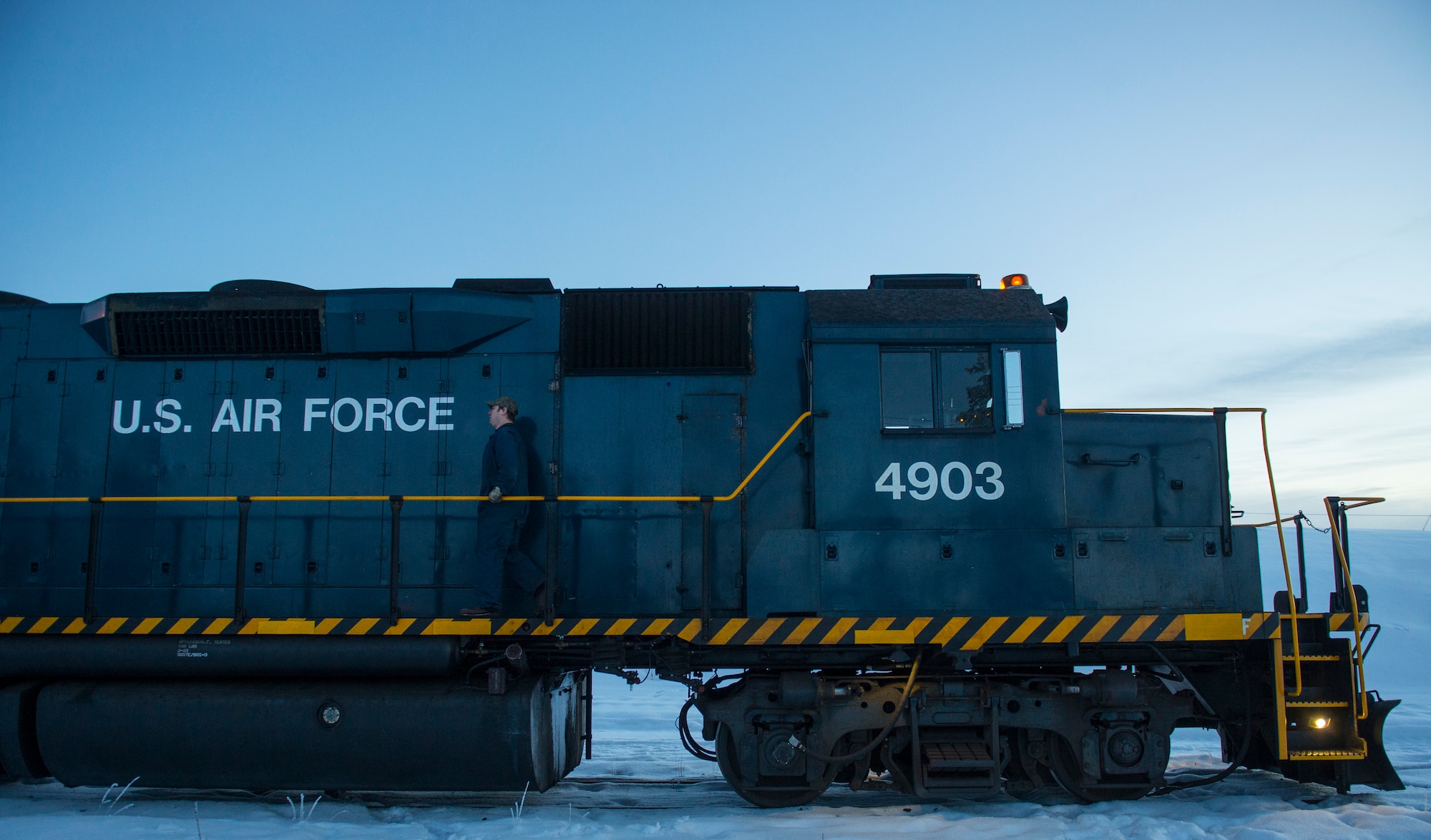 An Air Force locomotive prepares to transport coal to the central heat and power plant at Eielson Air Force Base, Alaska. The locomotive transports 800 tons of coal during the winter months and is the sole source of heat and power for the entire base. (U.S. Air Force photo by/Staff Sgt. Vernon Young Jr.)