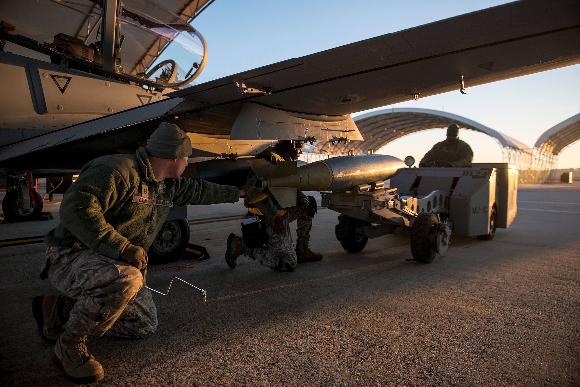 U.S. Air Force weapons advisors load an inert 500 pound training bomb on to an A-29 Super Tucano at Moody Air Force Base, Georgia. (U.S. Air Force photo/Master Sgt. Jeffrey Allen)