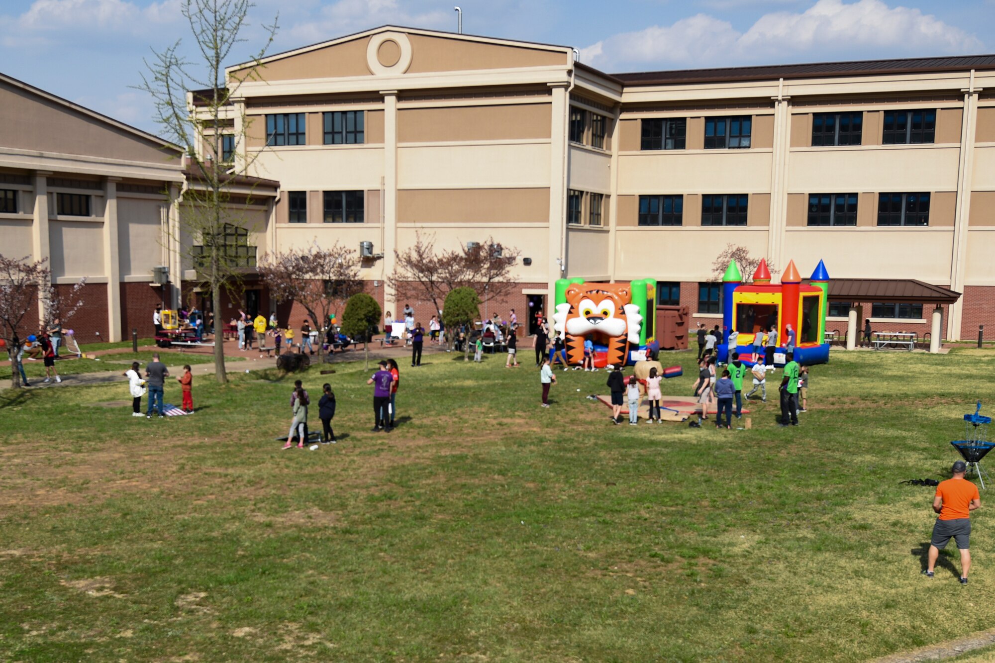 Children at the Day of Fun event for the Month of the Military Child wait in line for snow cones at Osan Air Base, Republic of Korea, April 9, 2021.