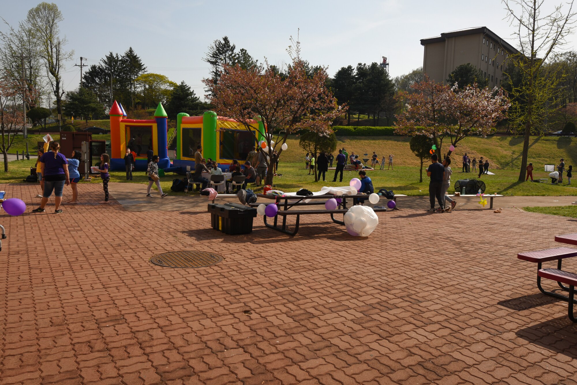 Children at the Day of Fun event for the Month of the Military Child wait in line for snow cones at Osan Air Base, Republic of Korea, April 9, 2021.