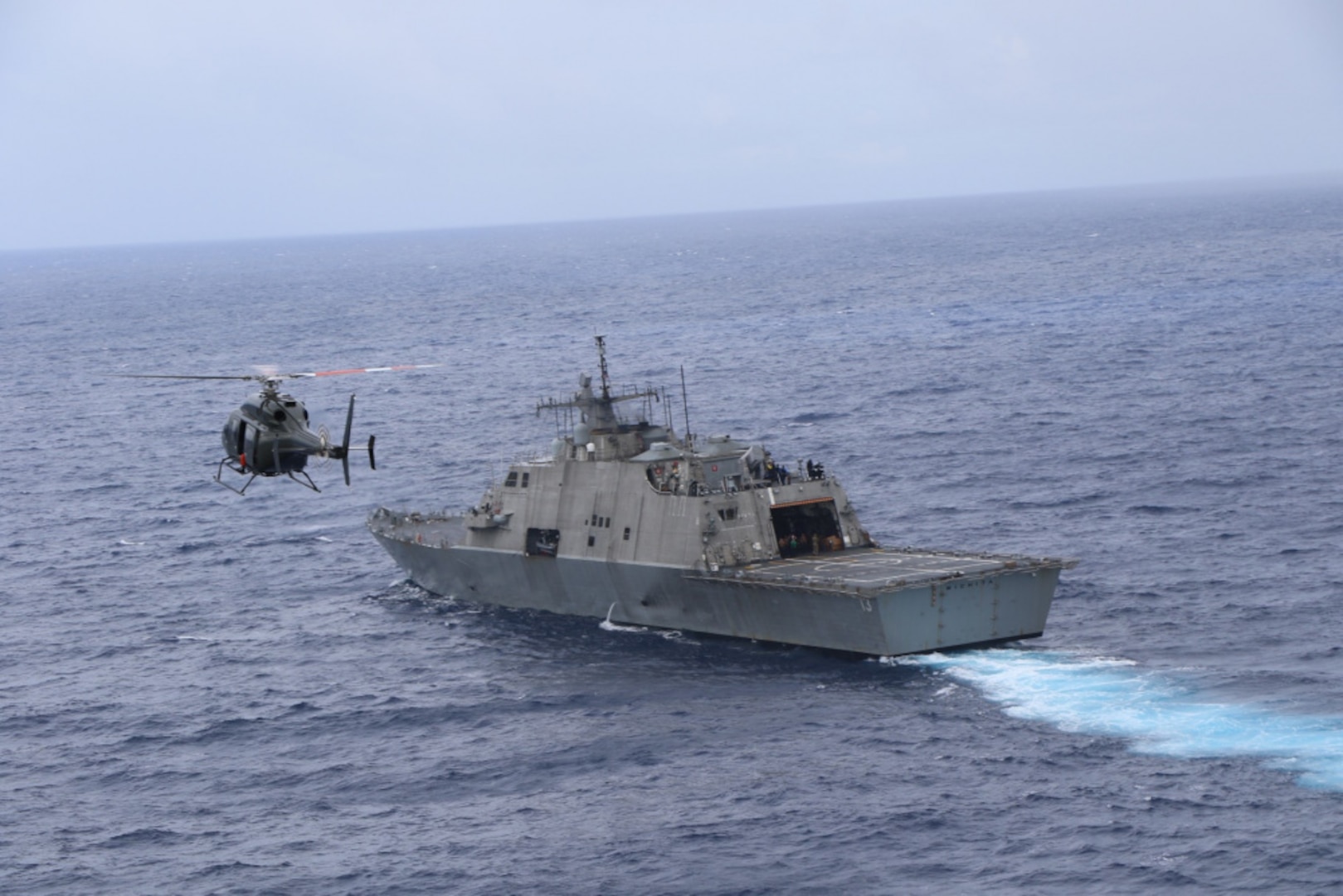 CARIBBEAN SEA – (April 9, 2021) -- The Freedom-variant littoral combat ship USS Wichita (LCS 13) and Jamaica Defence Force Coast Guard patrol vessel HMJS Cornwall sail in formation during a live-fire exercise April 9, 2021. Wichita is deployed to the U.S. 4th Fleet of operations to support Joint Interagency Task Force South’s mission, which include counter illicit drug trafficking in the Caribbean and Eastern Pacific