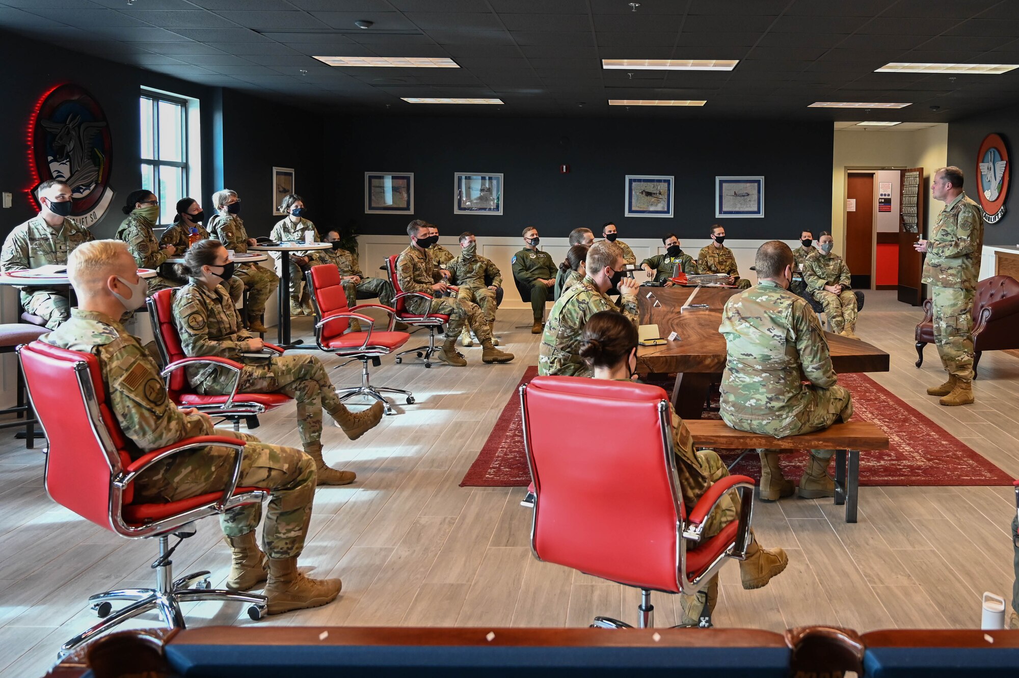 U.S. Air Force Maj. Gen. Thad Bibb, 18th Air Force commander, speaks to aircrew with the 4th Airlift Squadron at Joint Base Lewis-McChord, Washington, April 9, 2021.  Pilots and aircrew with the 4 AS received the chance to be mentored by 18th AF leadership. (U.S. Air Force photo by Airman 1st Class Callie Norton)