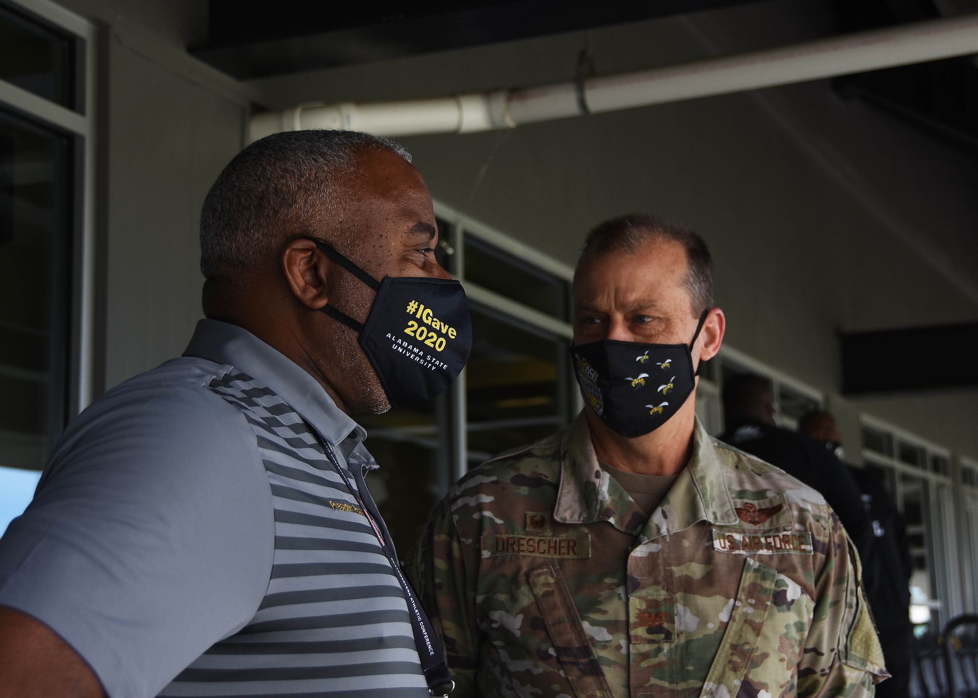 Alabama State University president, Dr. Quinton Ross and 908th Airlift Wing commander, Col. Craig Drescher discuss the ongoing partnership between the university and the wing before the 908th conducted a flyover prior to the start of an ASU home football game April 10 at ASU stadium in Montgomery, Alabama.