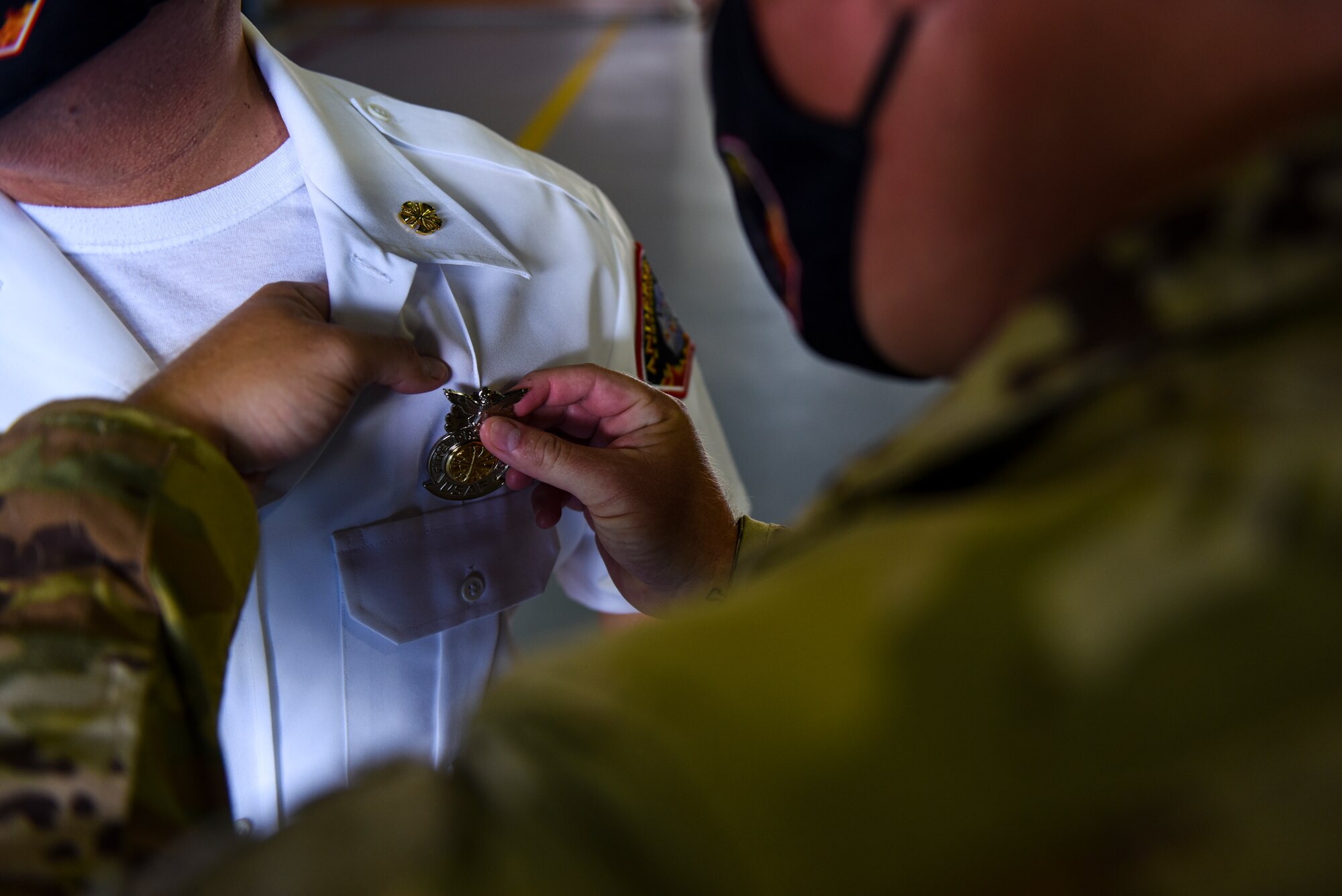 Firefighters pin on new badge